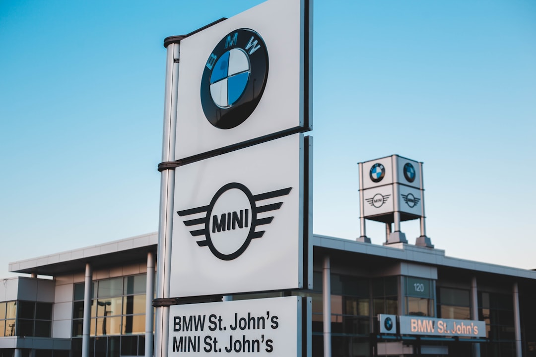 a bmw dealership sign in front of a bmw dealership