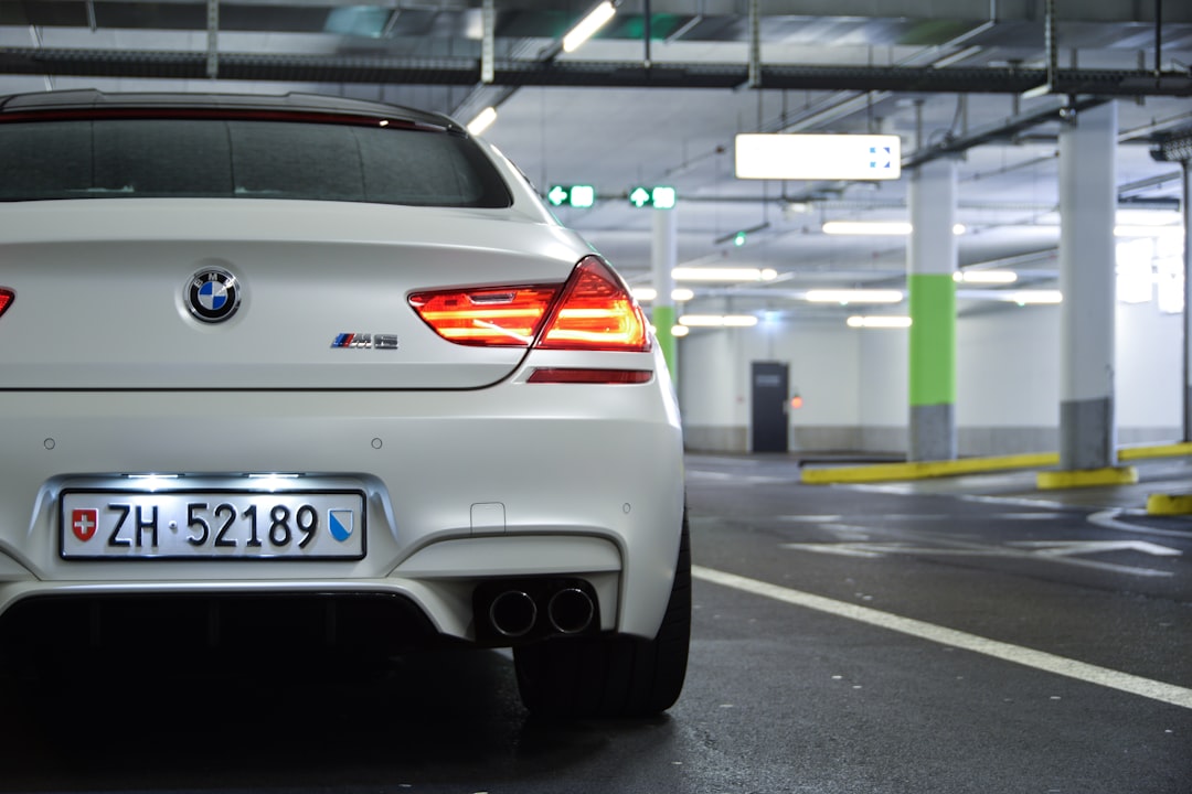 white bmw m 3 on road during daytime