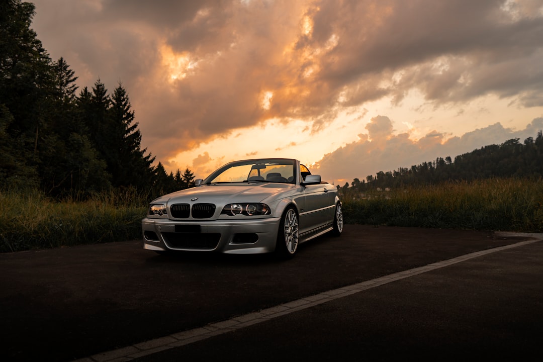 white bmw m 3 on road during daytime