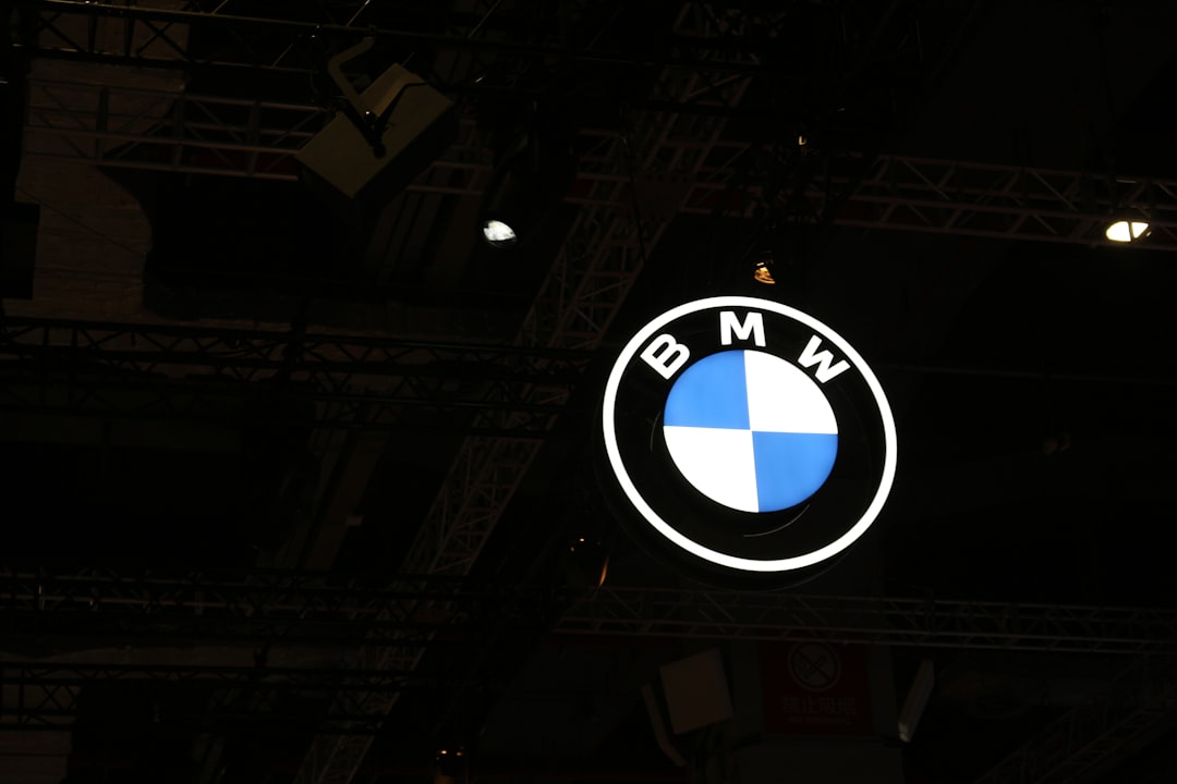 a bmw logo is lit up in the dark