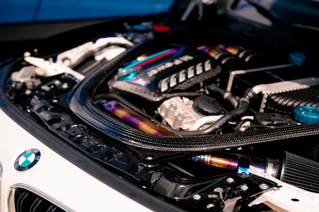 the engine of a bmw car with its hood open
