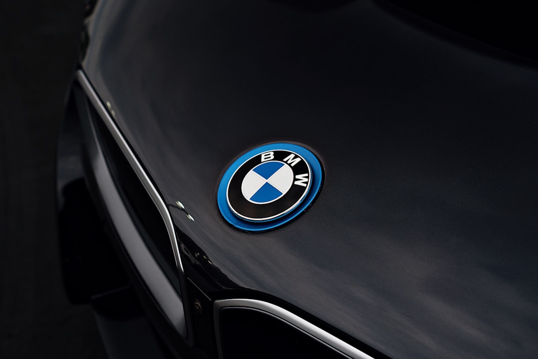 The BMW logo is prominently displayed on the car.