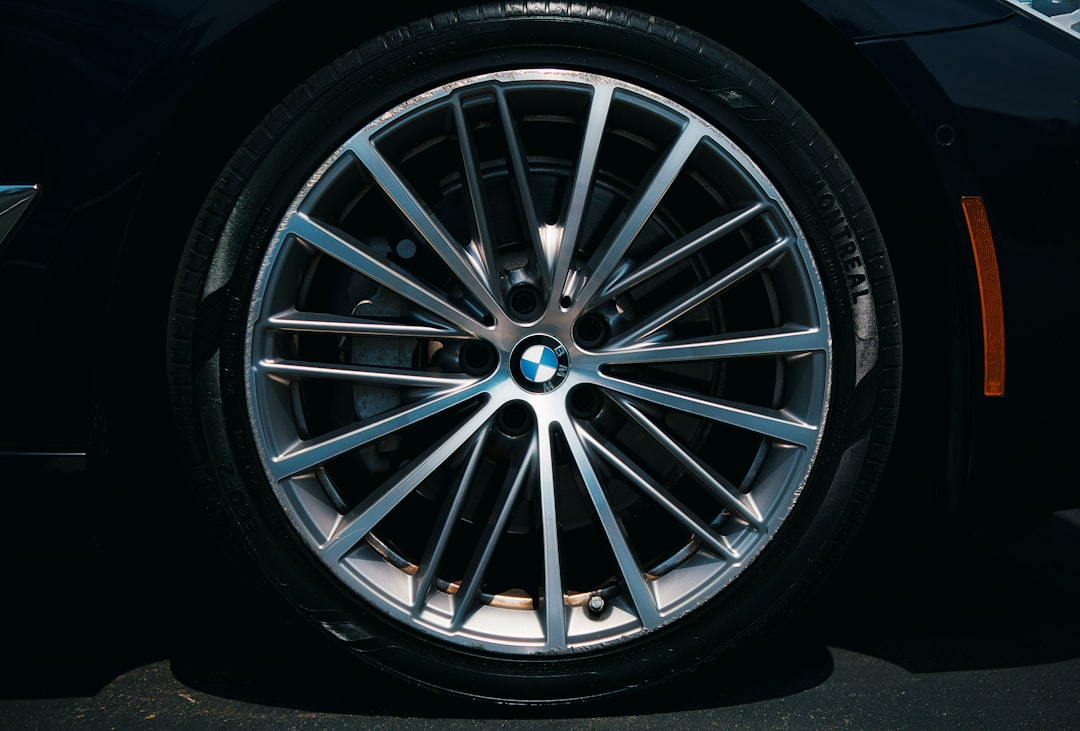 A shiny BMW wheel and tire.